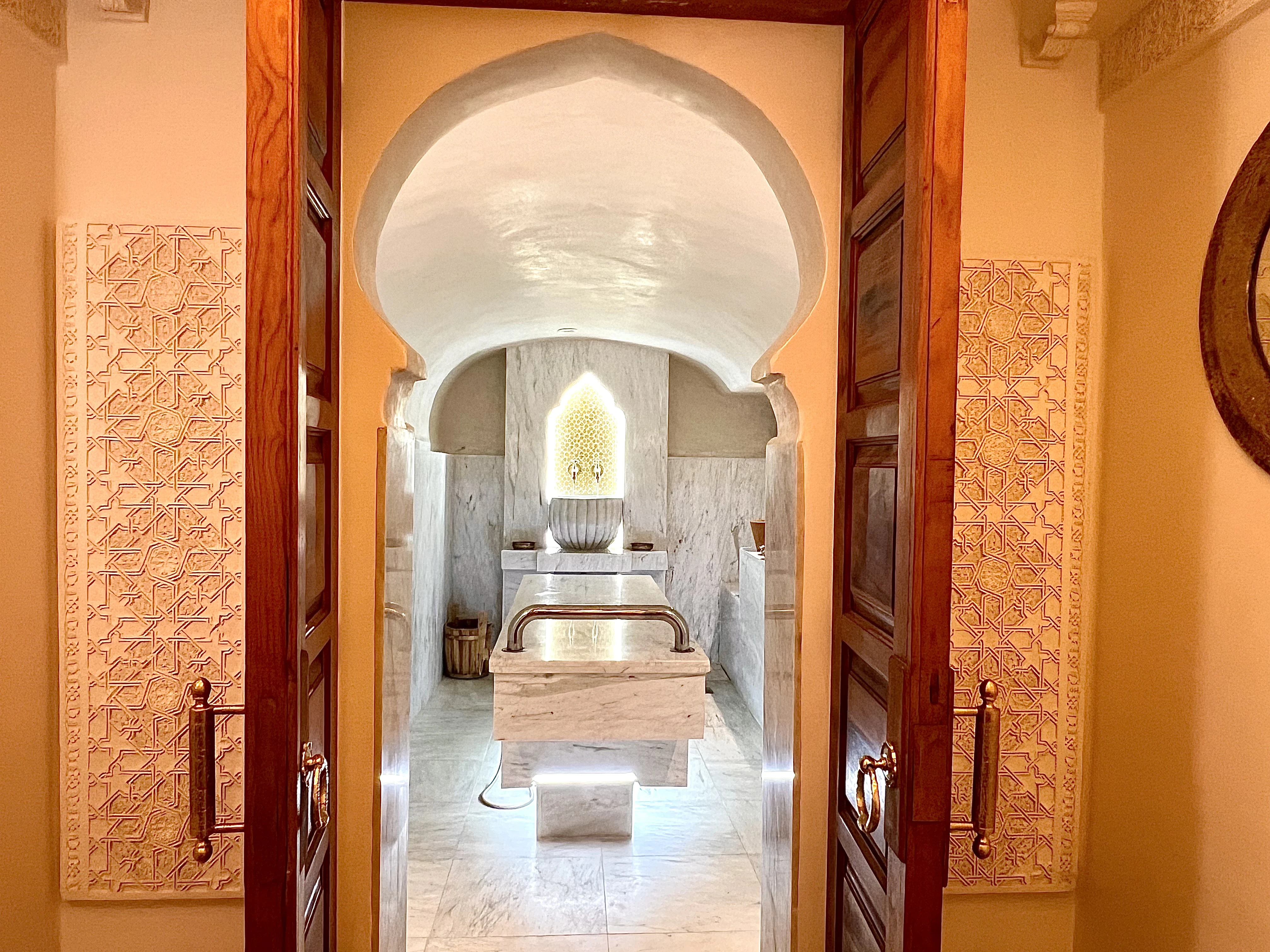 Traditional Moroccan Hammam with heated marble table at Spa du Calife - Riad Le Calife Fes